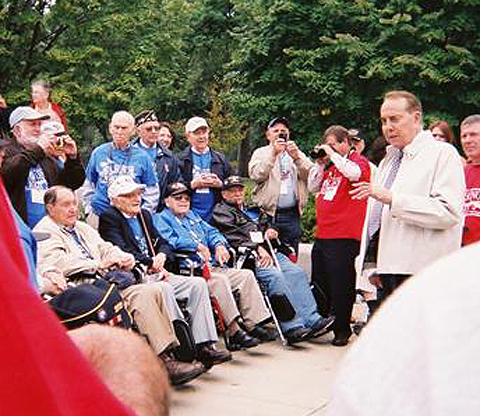 Senator Bob Dole addresses Frank and the other honored vets.