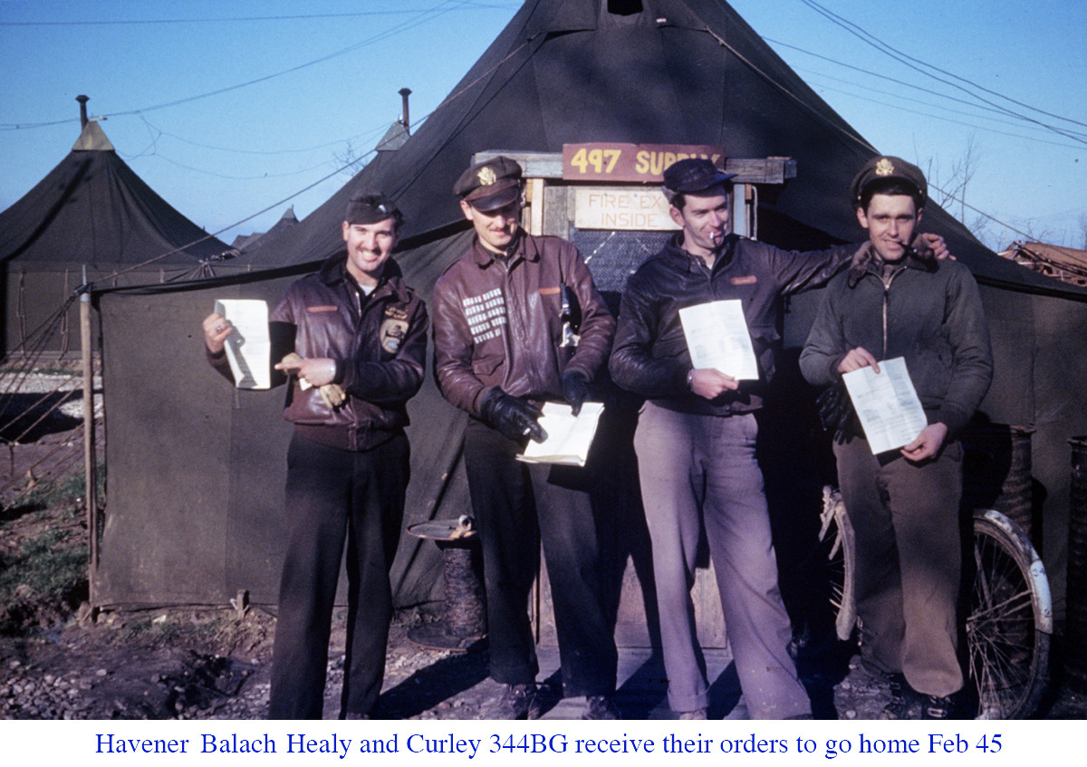 Havener and Balach and Healy and Curley 344BG receive their orders to go home Feb 45 copy